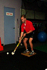 Drill #6  Partial Squat on Balance Board (side view)